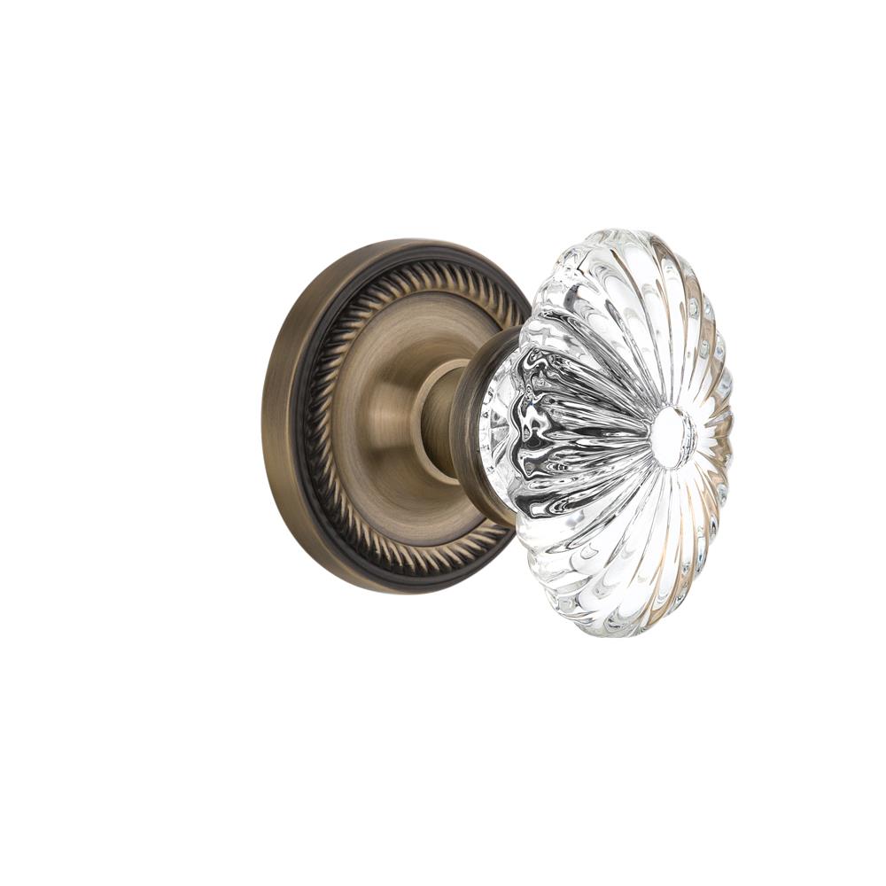 Nostalgic Warehouse ROPOFC Passage Knob Rope Rose with Oval Fluted Crystal Knob in Antique Brass